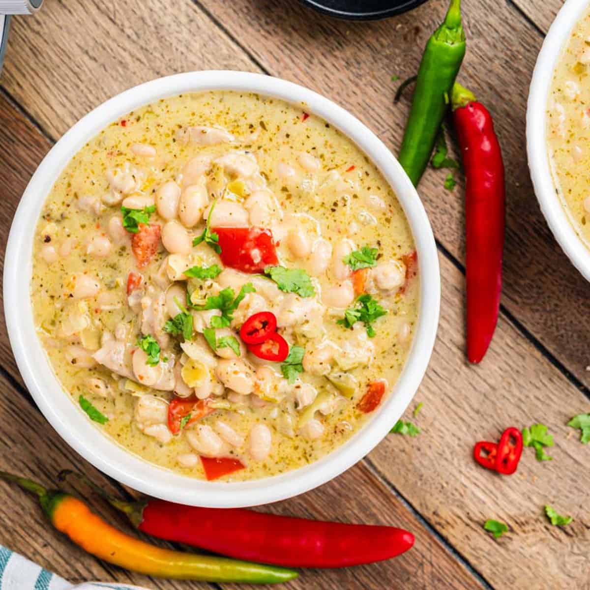 A bowl of white chicken chili.