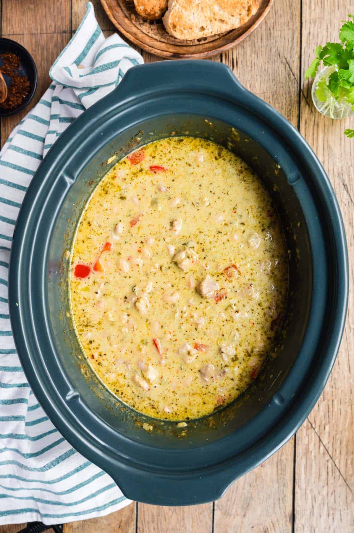 Some white chicken chili in a crock pot.