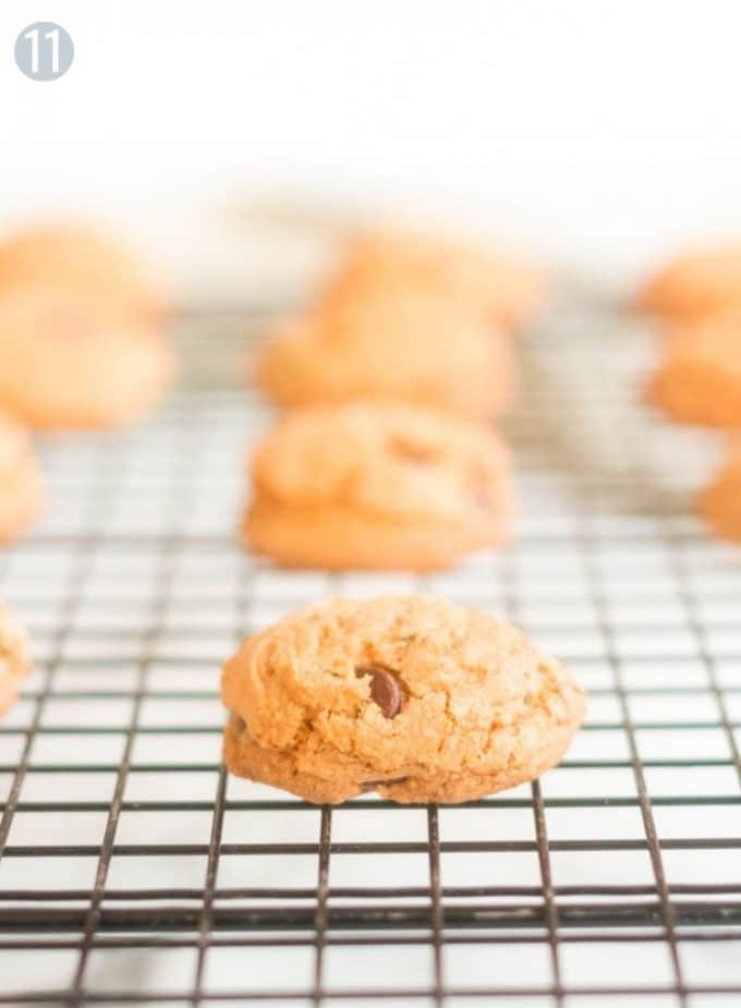 A close up of a cookie on a cooling rack