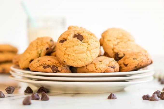 Plate of mint chocolate chip cookies garnished with chocolate chips.