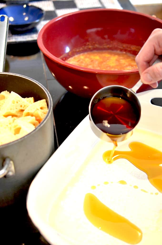 Lining a baking pan with puree maple syrup.