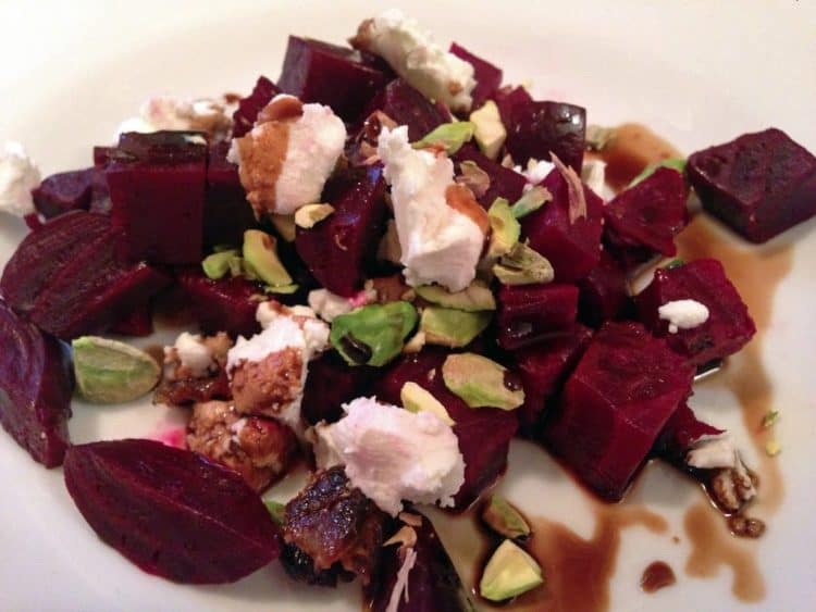 A plate of food with beet salad