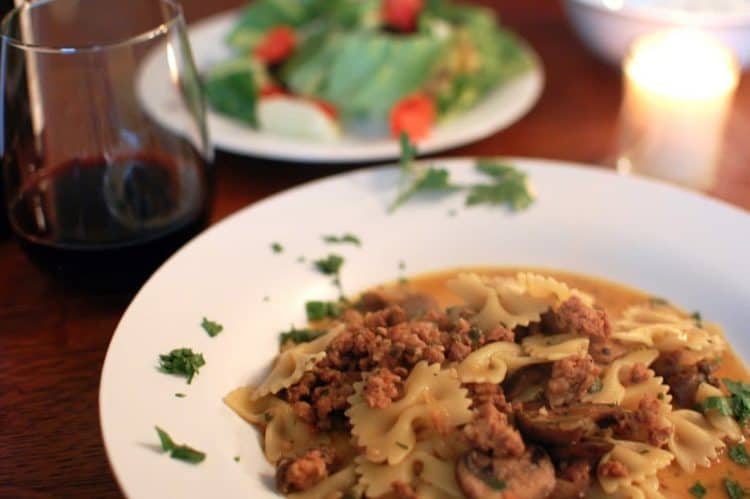 A plate of pasta on a table