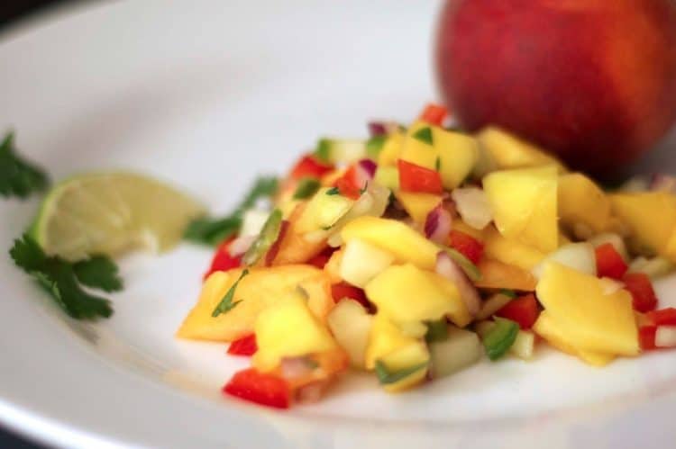 A plate of food, with Mango and Peach