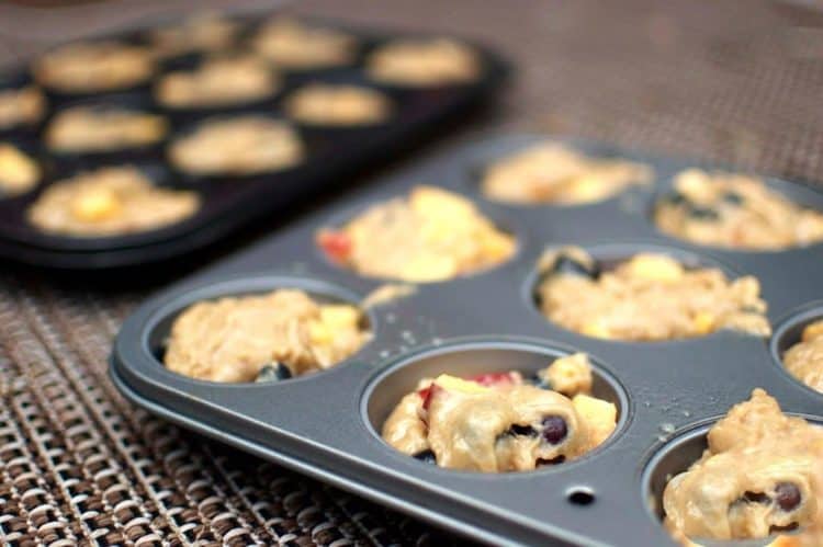 A muffin tray filled with batter