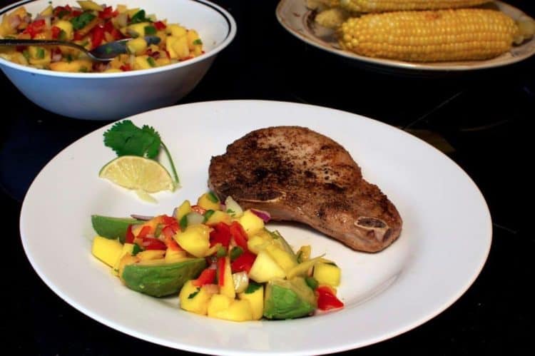 A plate of food on a table, with Mango and Peach