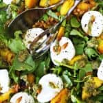 Some salad with peaches.