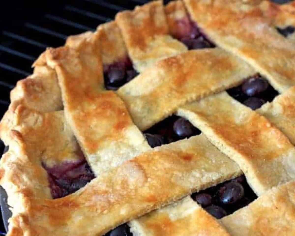 A blueberry pie with a lattice crust.