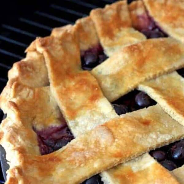 A blueberry pie with a lattice crust.