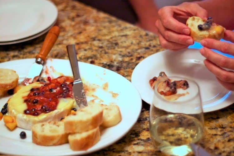 A plate of food on a table, with Bread