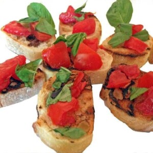 A close up of bruschetta on a plate.