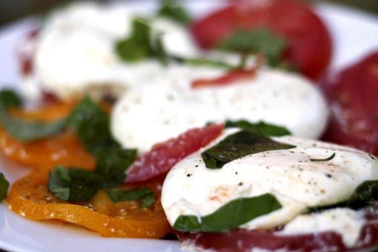 A plate of food with Burrata