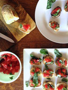 A plate of food on a table, with Bruschetta.