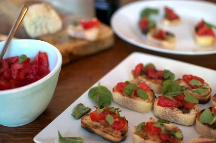 A close up of Bruschetta with tomatoes.