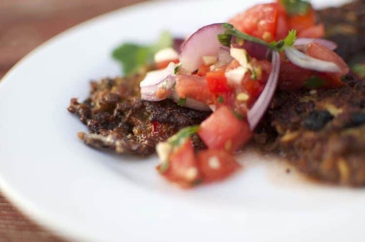 A plate of food with tomatoes