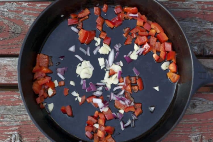 A skillet with vegetables