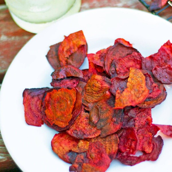 A plate of beet chips.