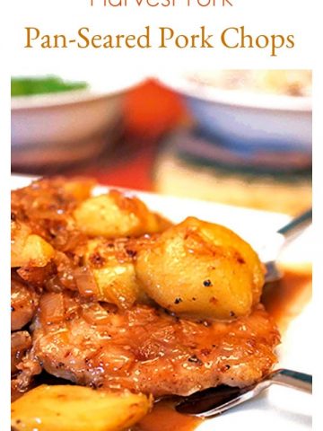 Plated pork chop and sauce with vegetables