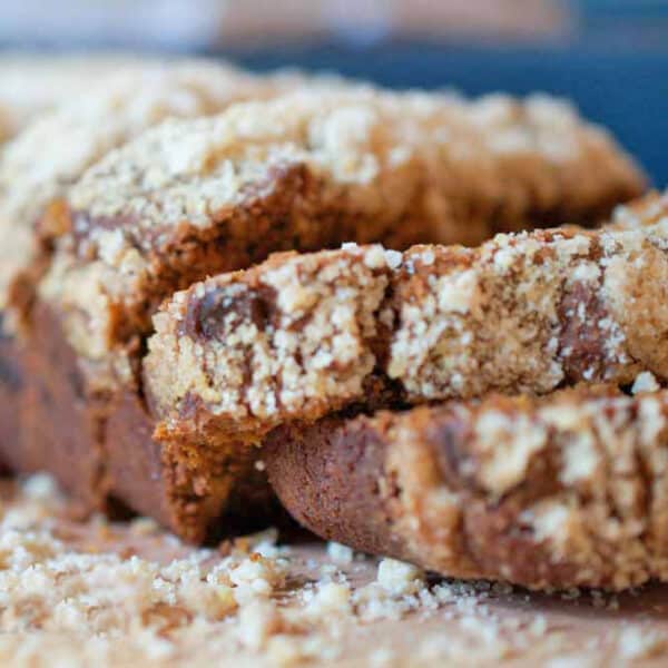 A loaf of pumpkin bread that is sliced.