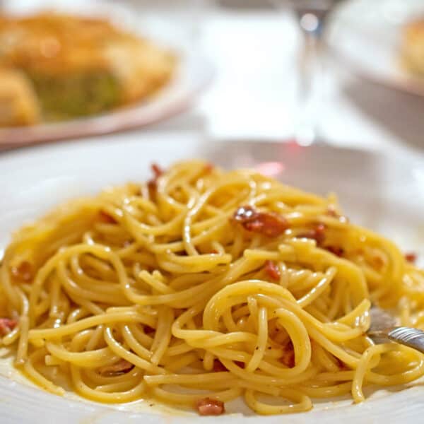 A plate of spaghetti carbonara.
