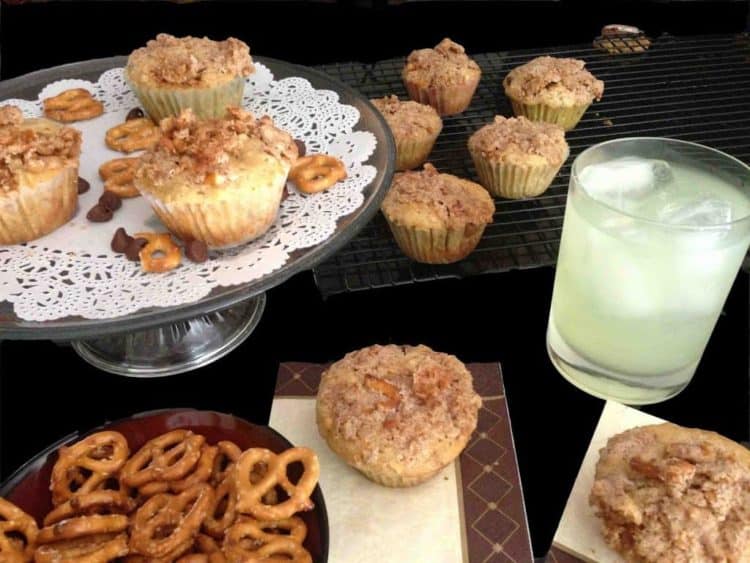 A bunch of pretzels muffins with milk.