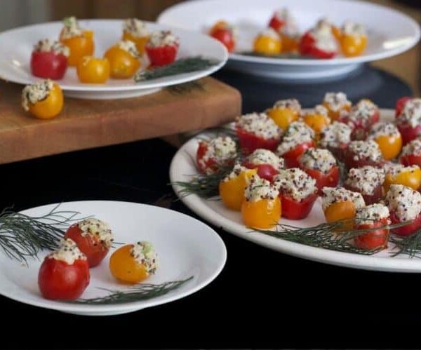 A plate of stuffed cherry tomatoes.