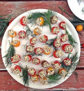 A plate of food on a table, with Quinoa and Cheese.