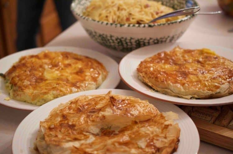 A plate of food on a table, with Pie.