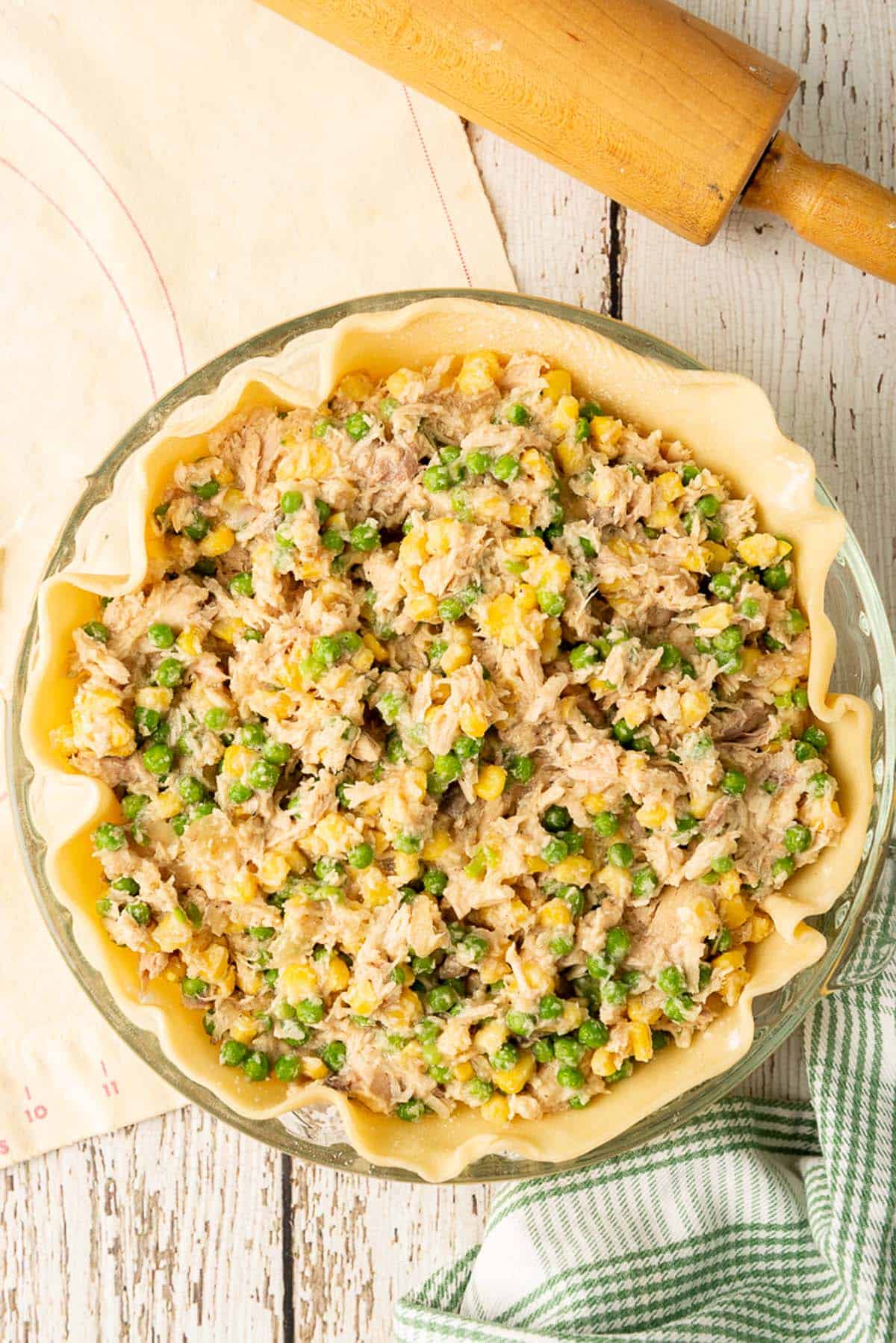 A pie crust filled with pot pie filling.