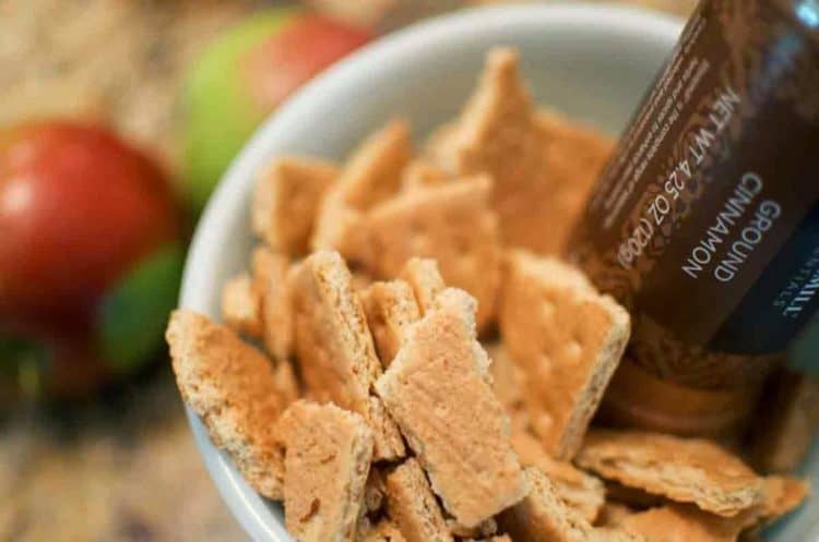 A close up of graham crackers being crushed.