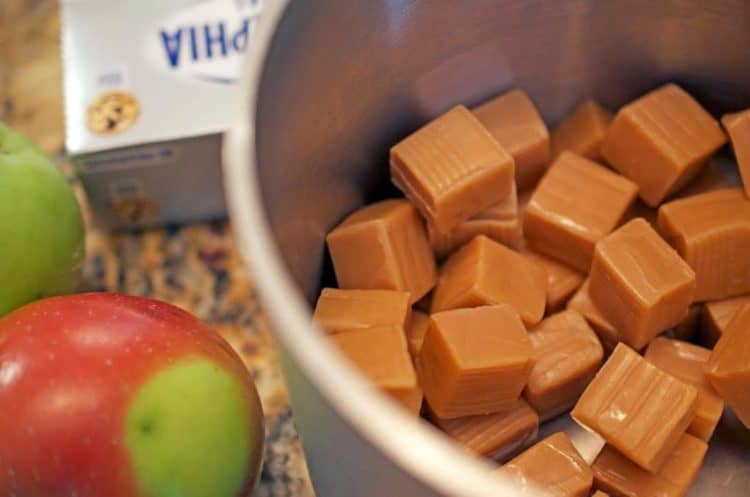 A bowl of square caramels.