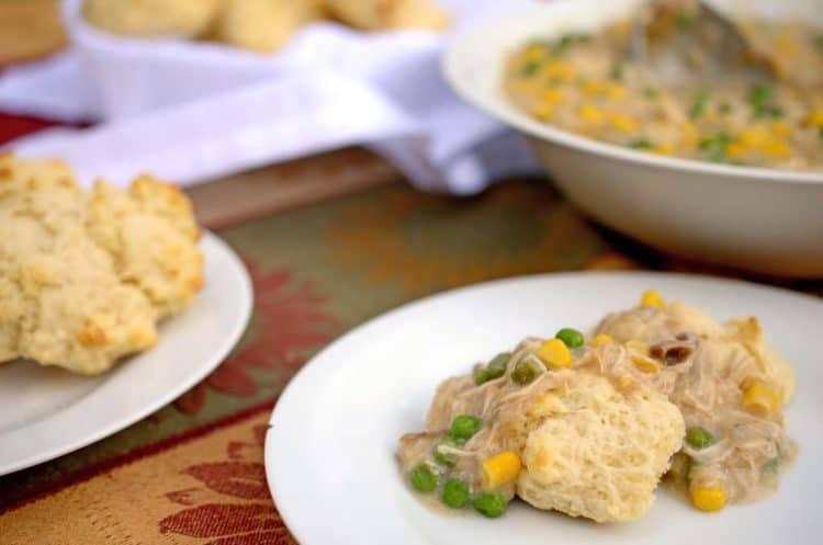A plate of chicken and biscuits