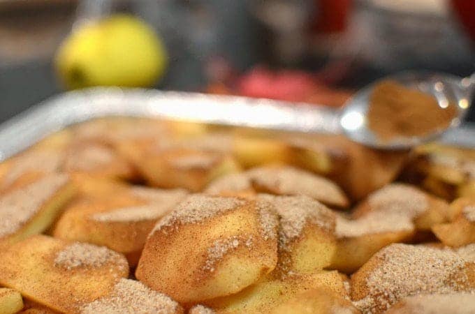Close shot of cut apples tossed with spiced sugar