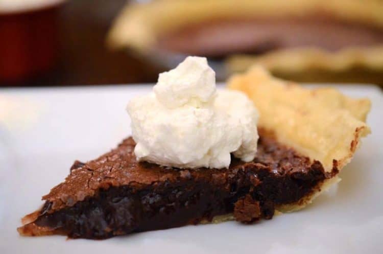 A close up of a slice of chocolate pie.