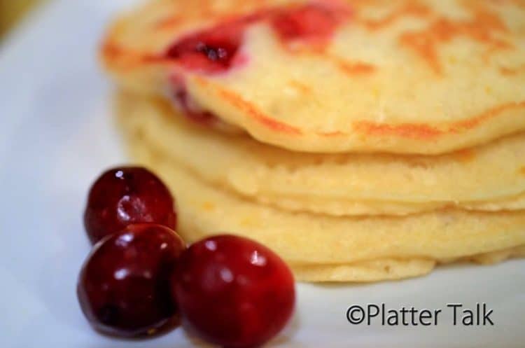 A close up of a stack of pancakes