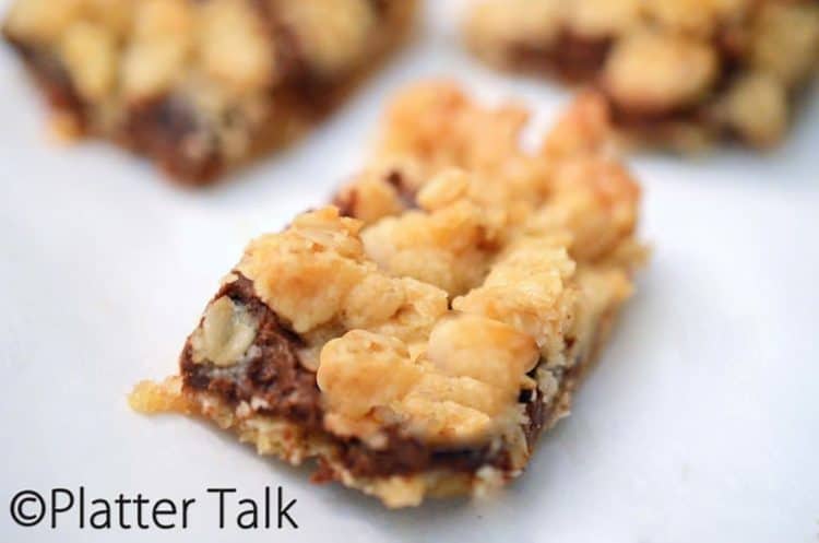 A close up of oatmeal bar on a plate.