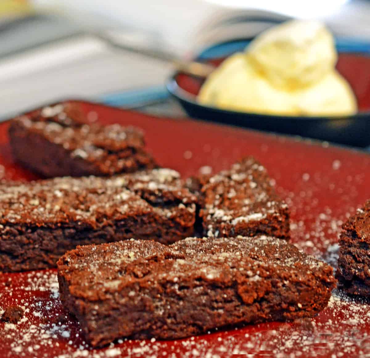 Some brownies with ice cream.