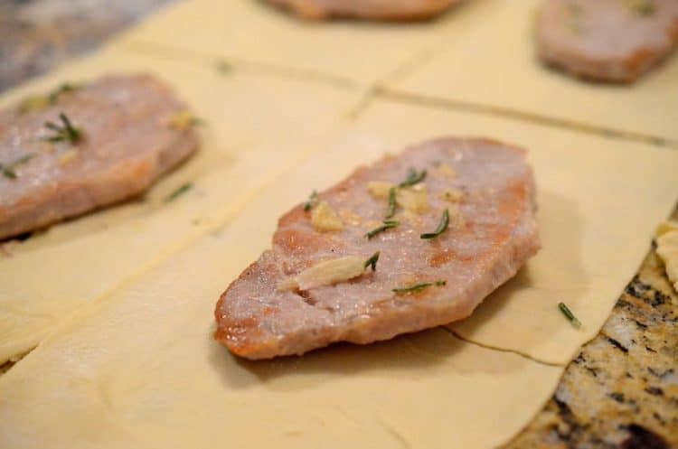 pork cutlet on pastry sheet