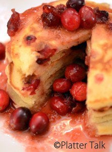 a stack of cranberry pancakes