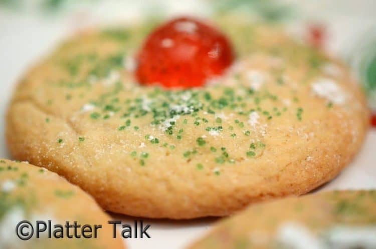 A close up of a cherry holiday cookie.