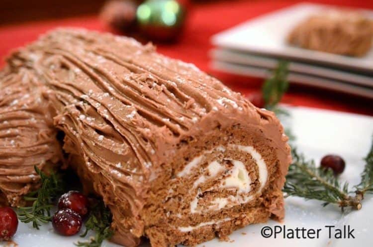 A close-up of a yule log cake.