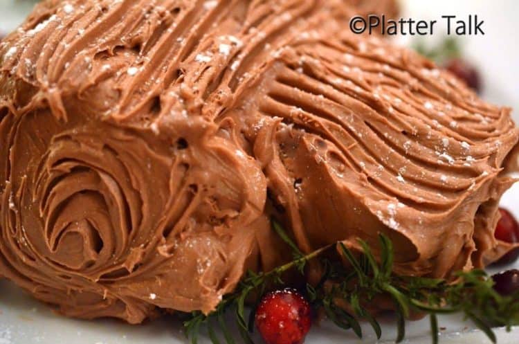 A close up of a chocolate yule log.