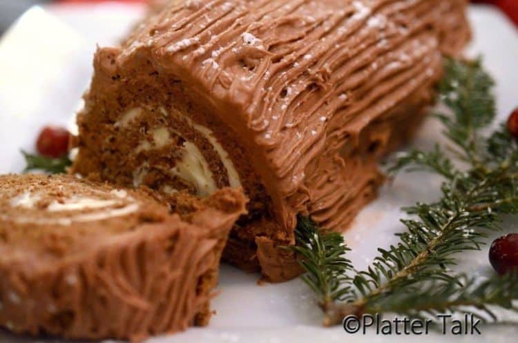 A close-up of a piece of yule log cake.