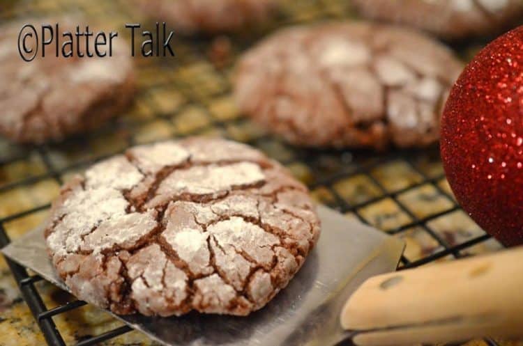 A cooling rack of fudge crinkle cookies.