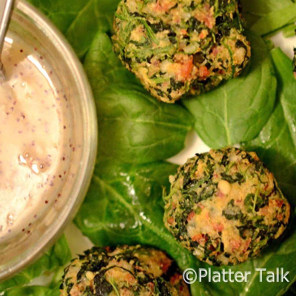 three bacon spinach balls with dip.