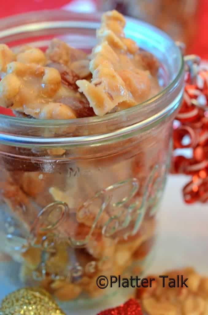 A jar full of peanut brittle.