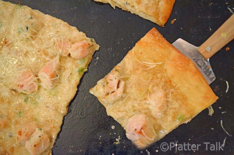 a slice of pizza on a spatula