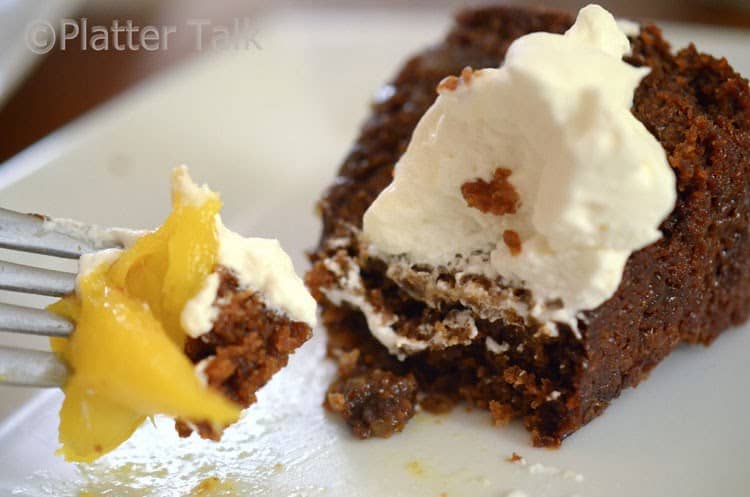 a slice of ginger cake with ice cream