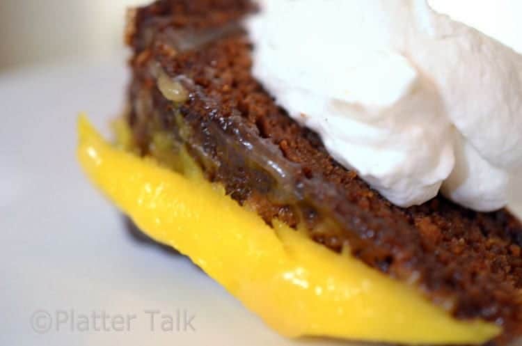 a close up of a slice of ginger cake