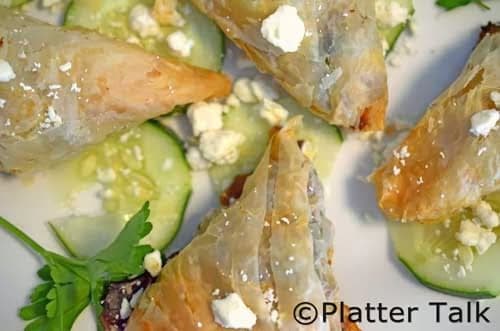 A close up of food, with Spanakopita.
